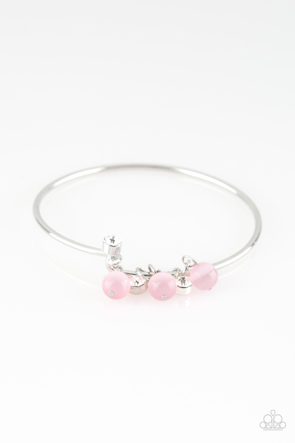 Glassy pink beads and glittery white rhinestones slide along a dainty silver wire infused with a rhinestone encrusted fitting, creating a versatile adjustable like bangle. Features a hinged closure.