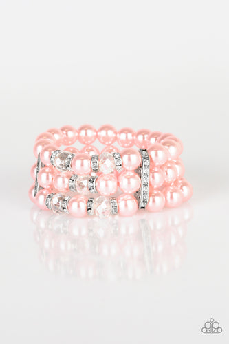 Pinched between white rhinestone encrusted frames, white rhinestone encrusted rings, crystal-beads, and pink pearls are threaded along elastic stretchy bands for a glamorous look.