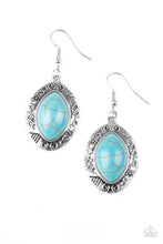 Load image into Gallery viewer, A refreshing turquoise stone is pressed into the center of a glistening silver frame radiating with floral and tribal inspired patterns for a seasonal look. Earring attaches to a standard fishhook fitting.
