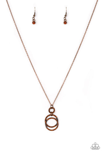 Encrusted in radiant rhinestones, three copper hoops interlock at the bottom of an elongated copper chain for an elegant look. Features an adjustable clasp closure.