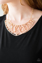 Load image into Gallery viewer, A shattered golden crescent-shaped frame swings below the collar for a striking look. Features an adjustable clasp closure.
