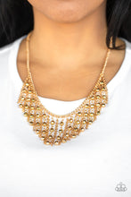 Load image into Gallery viewer, Stands of faceted gold beads and glistening gold chains stream from a matching gold chain, creating an edgy fringe below the collar. Features an adjustable clasp closure.
