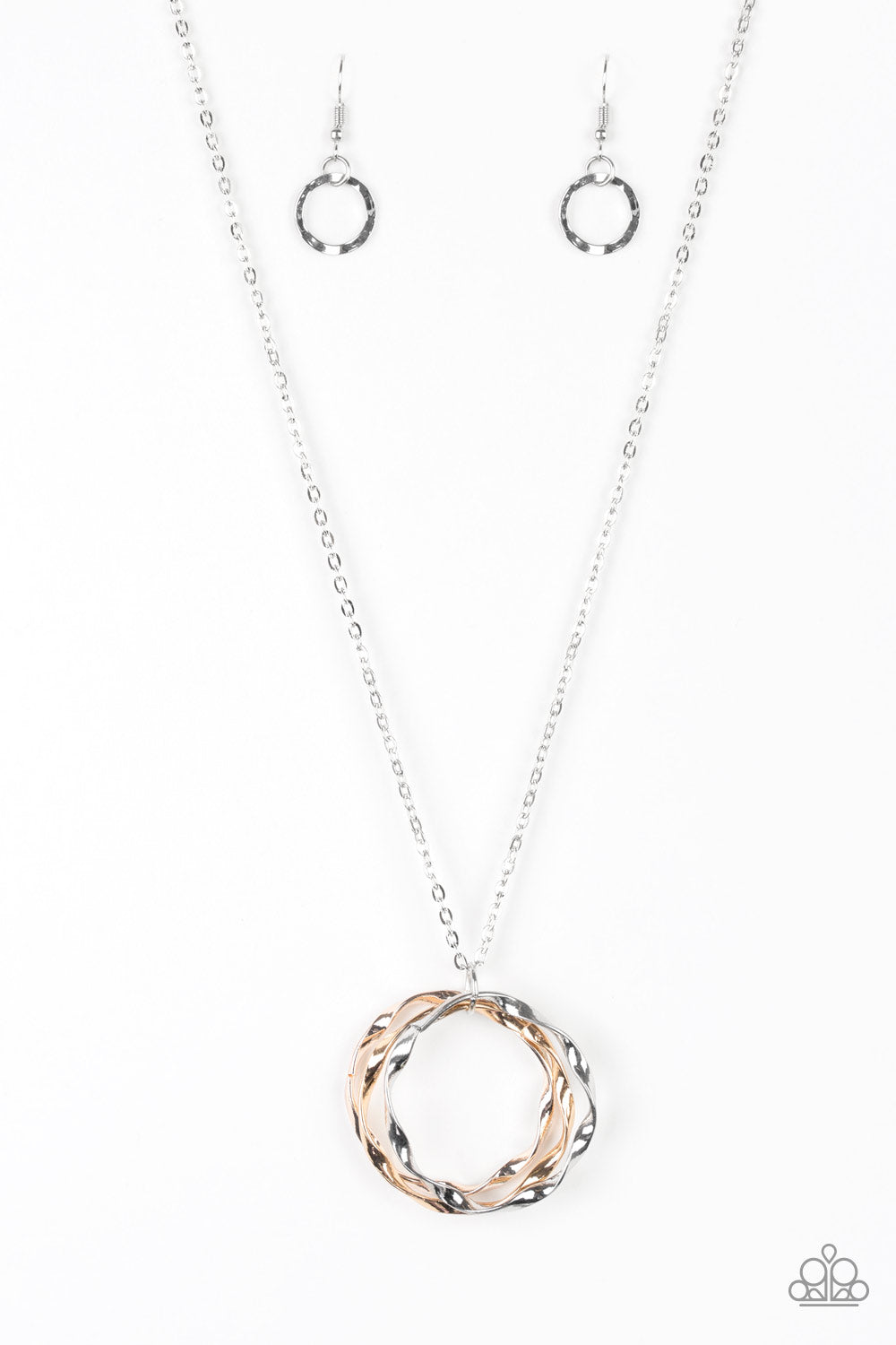 Twirling rose gold, gold, and silver hoops swing from the bottom of an elegantly elongated silver chain, creating a dizzying pendant. Features an adjustable clasp closure