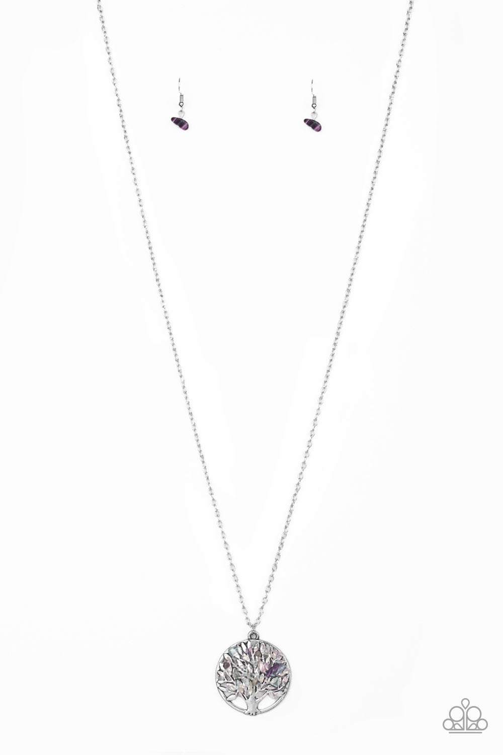 Bits of multicolored rock are sprinkled along a shimmery silver tree pendant, creating colorful leaves. As the stone elements in this piece are natural, some slight color variation is normal. Features an adjustable clasp closure.