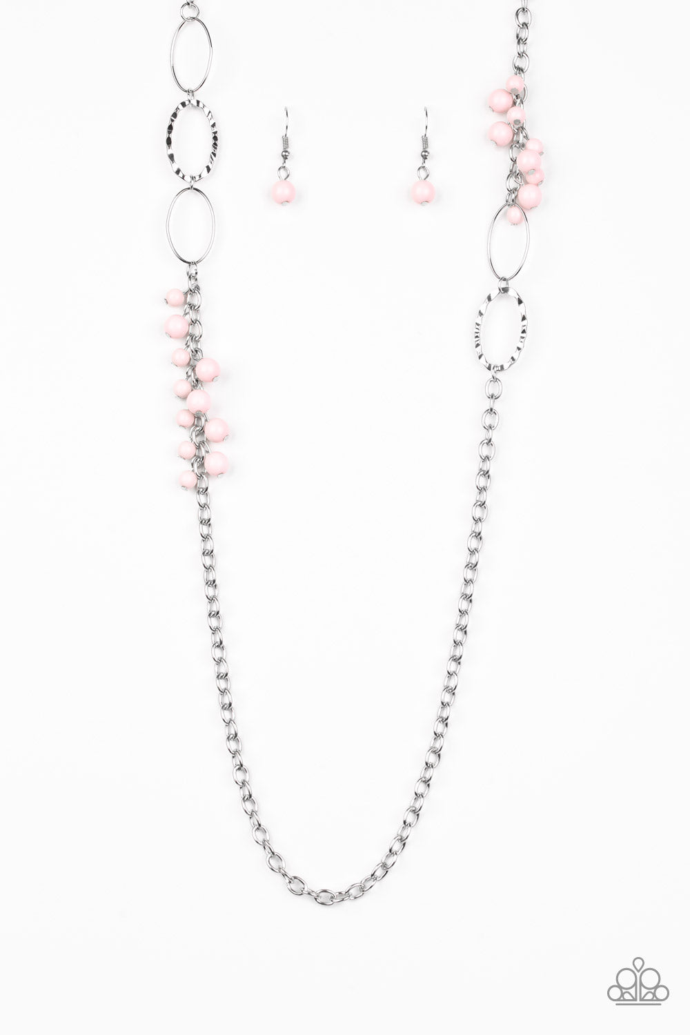 Smooth and hammered silver rings join clusters of shiny pink beads along a shimmery silver chain for a colorful look. Features an adjustable clasp closure.