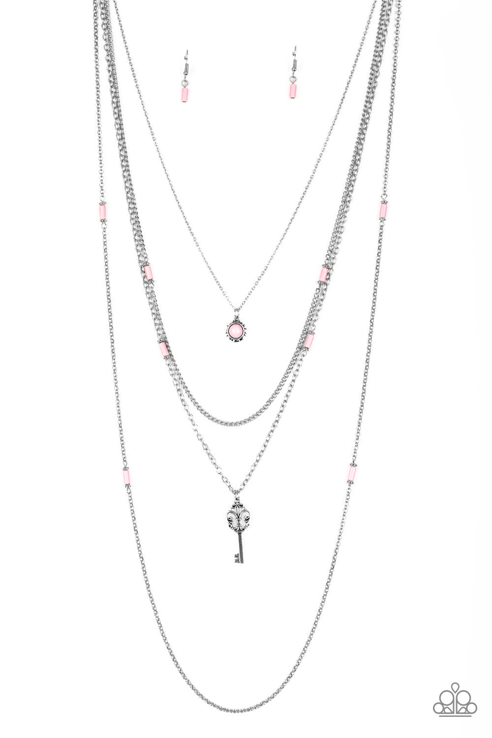 Featuring flirty pink and dainty silver accents, a pink beaded pendant gives way to a shimmery silver key for a whimsically layered look. Features an adjustable clasp closure.