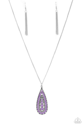 Brushed in a vivacious purple finish, a bubbly silver teardrop swings from the bottom of an elongated silver chain for a tribal inspired look. Features an adjustable clasp closure.