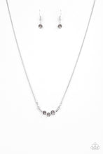 Load image into Gallery viewer, A trio of smoky rhinestones are encrusted along a bowing silver bar, creating a stellar pendant below the collar. Features an adjustable clasp closure.
