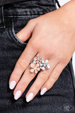 Load image into Gallery viewer, Two flowers in complementary shades of coral are paired with a silver flower in a sleek finish.  Each flower is dotted with brilliant white rhinestones for flawless light-catching detail. Features a stretchy band for a flexible fit.
