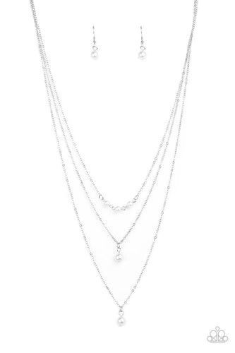A trio of pearly white beads give way to layers of solitaire white pearl pendants below the collar for a refined flair. Features an adjustable clasp closure.