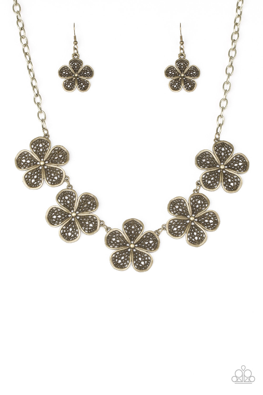 Featuring lace-like petals, glistening brass daisies link below the collar for a seasonal look. Features an adjustable clasp closure.