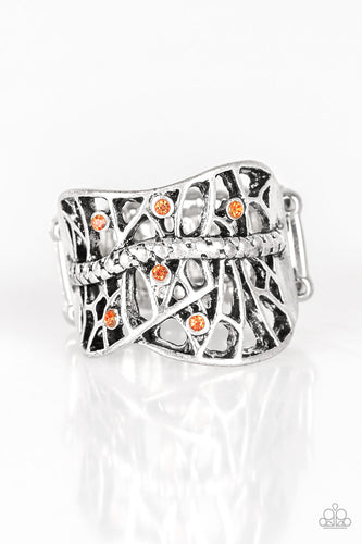 Dainty orange rhinestones are sprinkled along a shattered silver frame, creating an edgy centerpiece atop the finger. Features a stretchy band for a flexible fit.