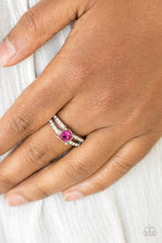 Load image into Gallery viewer, A glittery pink rhinestone sits atop two shimmery silver bands encrusted in glassy white rhinestones for a glamorous look. Features a dainty stretchy band for a flexible fit.
