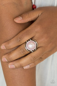 Shiny silver bands and white rhinestone encrusted bands flare from a pink pearl drop center for a glamorous look. Features a stretchy band for a flexible fit.