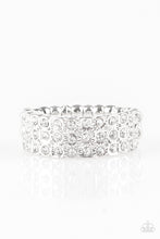 Load image into Gallery viewer, Row after row of dazzling white rhinestones are encrusted along a dainty silver band, creating timeless shimmer. Features a dainty stretchy band for a flexible fit.
