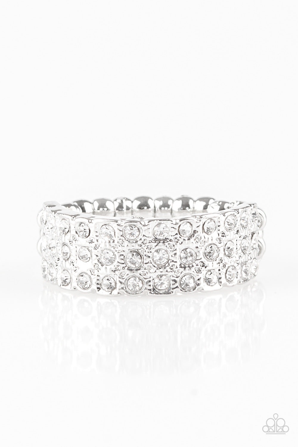 Row after row of dazzling white rhinestones are encrusted along a dainty silver band, creating timeless shimmer. Features a dainty stretchy band for a flexible fit.