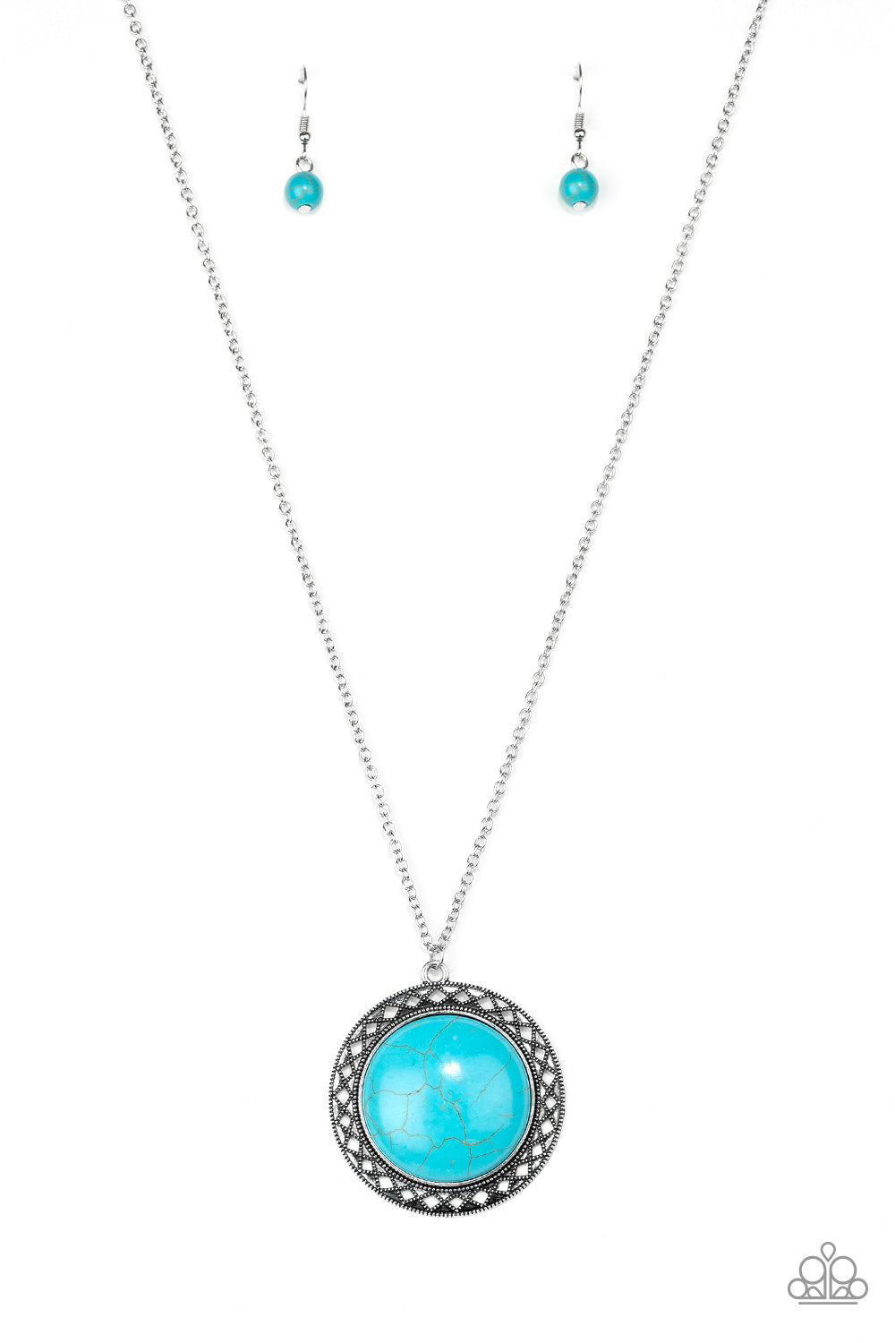 A refreshing turquoise stone is pressed into the center of a shimmery silver frame radiating with sunburst details. The earthy frame swings from the bottom of a lengthened silver chain for a seasonal finish. Features an adjustable clasp closure.