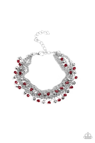 Dainty silver and red crystal-like beads cascade from two shimmery silver chains. Infused with plain silver chains, the colorful strands layer around the wrist for a flirtatious look. Features an adjustable clasp closure.