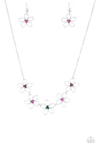 Dotted with radiant multicolored rhinestone centers, airy silver flowers link below the collar for a seasonal look. Features an adjustable clasp closure.