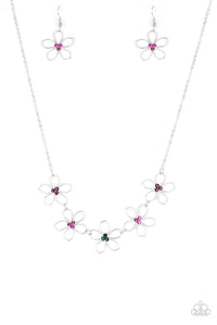 Dotted with radiant multicolored rhinestone centers, airy silver flowers link below the collar for a seasonal look. Features an adjustable clasp closure.