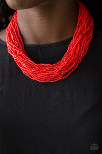 Infused with two bold silver fittings, countless strands of fiery red seed beads drape below the collar for a seasonal look. Features an adjustable clasp closure.  Sold as one individual necklace. Includes one pair of matching earrings.