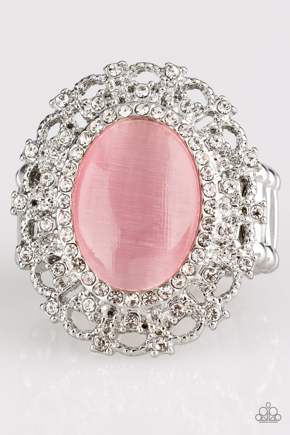 Encrusted in dainty white rhinestones, a frilly silver frame spins around a glowing pink moonstone center for a regal look. Features a stretchy band for a flexible fit.