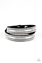 Load image into Gallery viewer, Rows of classic silver chain, flat silver chain, and dainty white rhinestones are encrusted along a black suede band for a sassy look. The elongated band allows for a trendy double wrap design. Features an adjustable snap closure.
