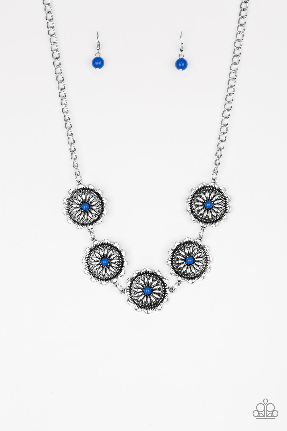 Infused with bright blue beaded centers, ornate floral stamped frames link below the collar for a colorfully, seasonal look. Features an adjustable clasp closure.