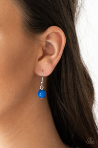 Infused with bright blue beaded centers, ornate floral stamped frames link below the collar for a colorfully, seasonal look. Features an adjustable clasp closure.