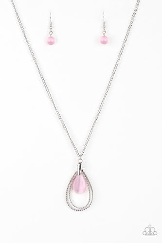 Studded silver teardrops swing from the bottom of a shimmery silver chain. A glowing pink moonstone attaches to the innermost frame, creating a whimsical pendant. Features an adjustable clasp closure.