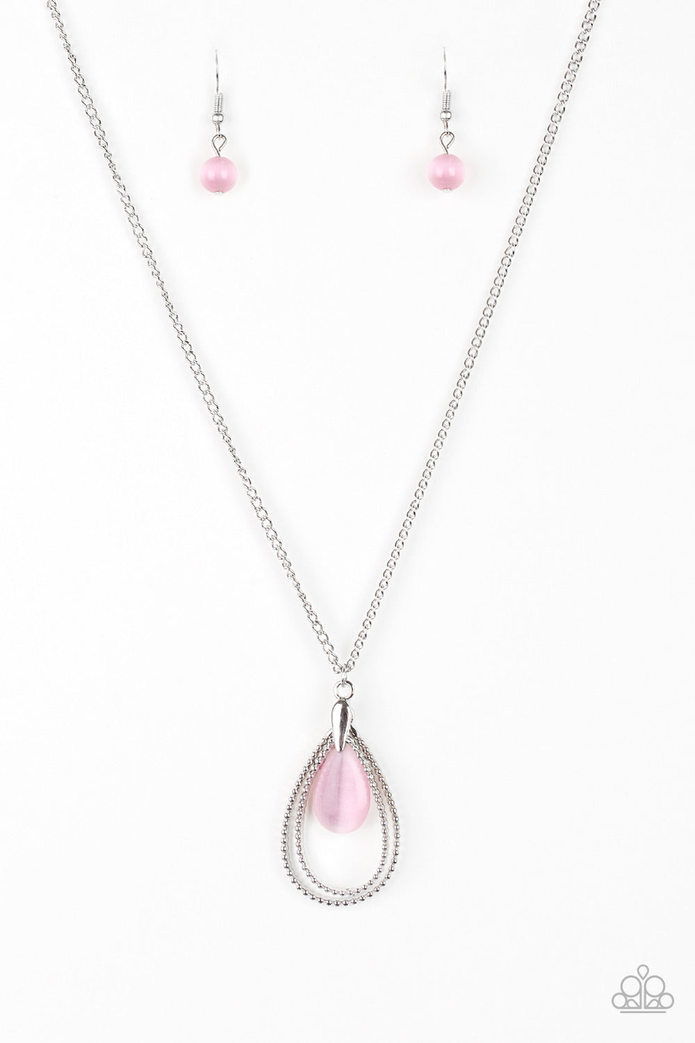 Studded silver teardrops swing from the bottom of a shimmery silver chain. A glowing pink moonstone attaches to the innermost frame, creating a whimsical pendant. Features an adjustable clasp closure.
