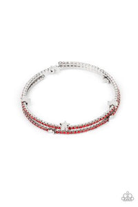 Dotted with dainty silver star charms, a bendable row of fiery red rhinestones spirals around the wrist, creating a sparkly infinity wrap bracelet.  Sold as one individual bracelet.