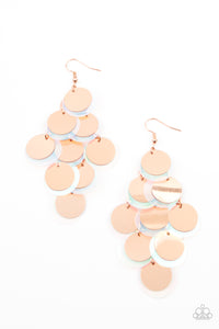 A bubbly collection of oversized shiny copper and iridescent sequins cascade from the ear, creating a flirty holographic fringe. Earring attaches to a standard fishhook fitting.