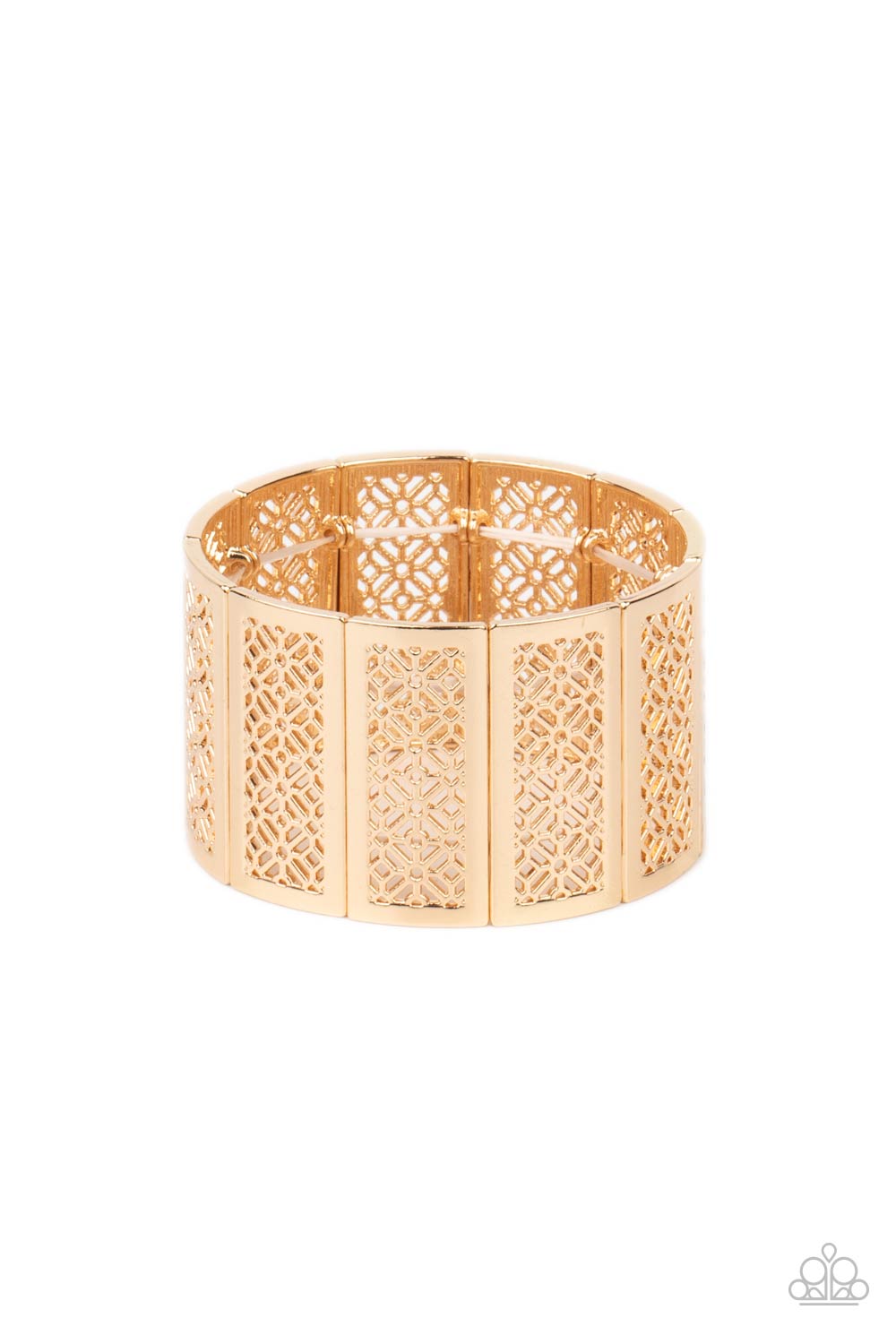 Filled with airy stenciled floral patterns, rectangular shiny gold frames are threaded along stretchy bands around the wrist, creating a whimsical centerpiece.