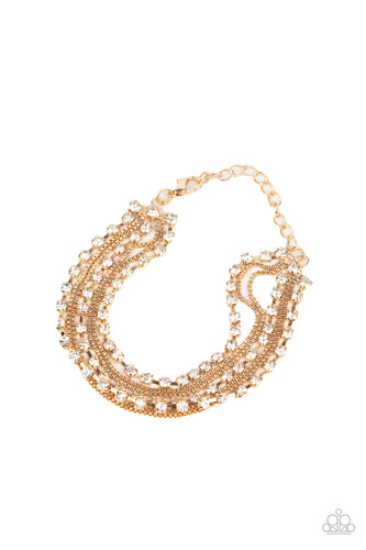 Strands of glittery white rhinestones and rows of dainty gold box chains alternate across the wrist, layering into a sassy display of sparkle. Features an adjustable clasp closure.  Sold as one individual bracelet.