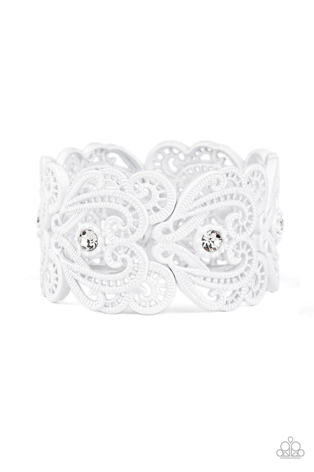 Painted in a refreshing white finish, lacy metallic frames are threaded along stretchy bands around the wrist. Glassy white rhinestones dot each frame, adding elegant shimmer to the whimsical piece.