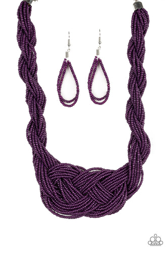 Countless strands of plum seed beads are twisted and knotted together to create an unforgettable statement piece. Features an adjustable clasp closure.