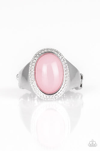 A cloudy pink bead is pressed into the center of a dainty silver band radiating with studded silver textures for a whimsical look. Features a dainty stretchy band for a flexible fit.