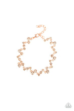 Load image into Gallery viewer, Varying in size, a collection of rhinestones connect across the wrist for a timeless look. Features an adjustable clasp closure.
