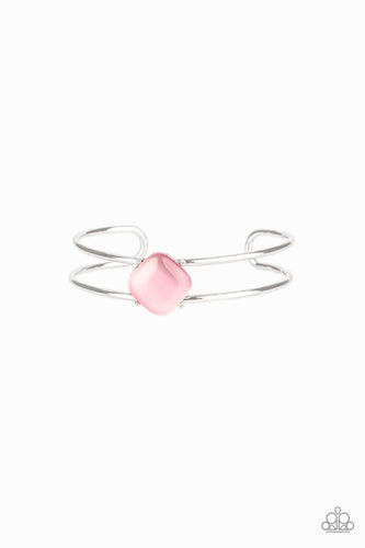 Chiseled into a tranquil square, a glowing pink moonstone is pressed into the center of an airy silver cuff for a perfect pop of color.