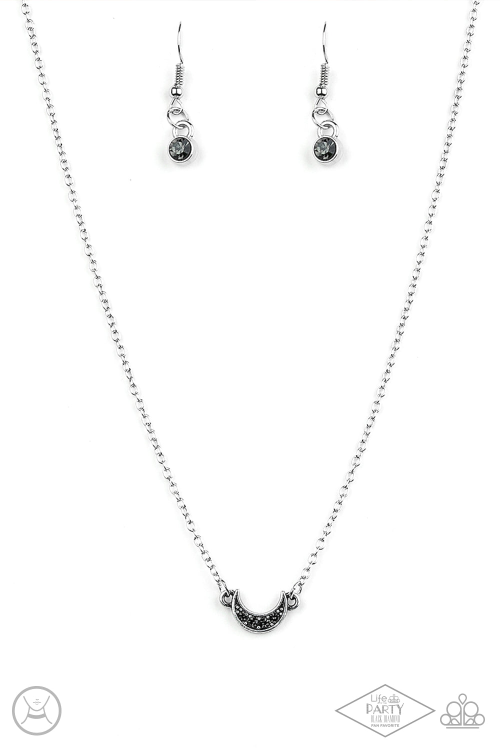 Encrusted in smoky rhinestones, a dainty silver half-moon frame attaches to a dainty shimmery chain around the neck for a minimalist inspired fashion. Features an adjustable clasp closure.