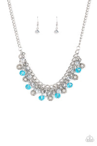 A collection of metallic net covered beads, shiny silver beads, and glittery blue and metallic flecked crystal-like beads swing from the bottom of interlocking silver chains, creating a refined fringe below the collar. Features an adjustable clasp closure.