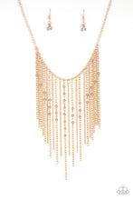 Load image into Gallery viewer, Varying in length, mismatched gold chains stream from the bottom of a classic gold chain. Faceted golden crystal-like beads sporadically dot the free-falling chains, creating a statement-making fringe below the collar. Features an adjustable clasp closure.
