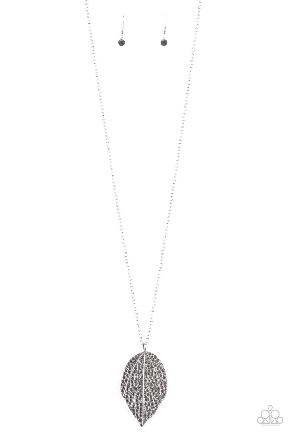 Featuring lifelike patterns, a hematite rhinestone encrusted silver leaf swings from the bottom of a lengthened silver chain, creating an edgy pendant. Features an adjustable clasp closure.