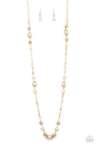 Capped in ornate gold frames, a collection of bubbly white pearls and glistening gold beads trickle along sections of shiny gold chain across the chest for a timeless sophistication. Features an adjustable clasp closure.