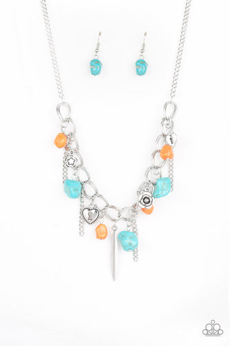 A whimsical array of turquoise and orange rock beads, glistening silver chains, and an assortment of floral and heart charms swing from a double-linked silver chain, creating a flirtatious fringe below the collar. Features an adjustable clasp closure. 