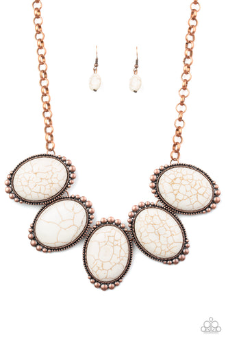 Chiseled into tranquil ovals, oversized white stones are pressed into antiqued copper frames radiating with studded textures. The refreshing frames delicately link below the collar for a statement-making finish. Features an adjustable clasp closure.