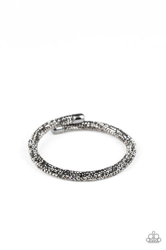 Bedazzled in glittery hematite rhinestones, a bendable cuff-like bracelet delicately curls around the wrist for a refined look. Sold as one individual bracelet.