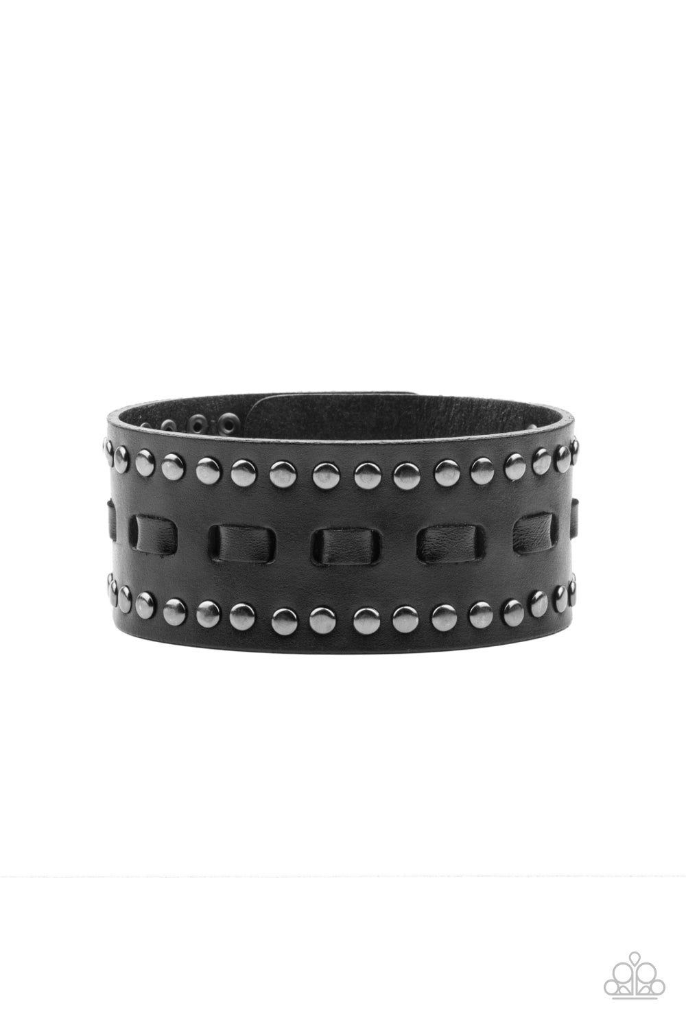 Black laces are threaded through the center of a black leather band that has been studded in gunmetal accents, creating a rustic centerpiece around the wrist. Features an adjustable snap closure.  Sold as one individual bracelet.
