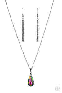 A glittery oil spill teardrop gem swings from the bottom of a glistening gunmetal chain, creating a stellar pendant below the collar. Features an adjustable clasp closure.